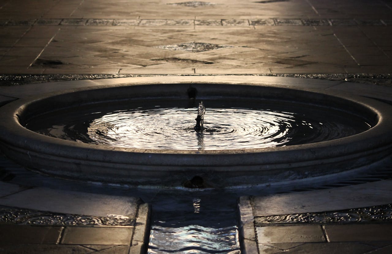 Elegant water fountain with gentle ripples.