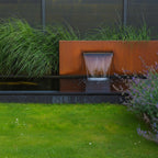 Corten steel freestanding pond wall with blade waterfall