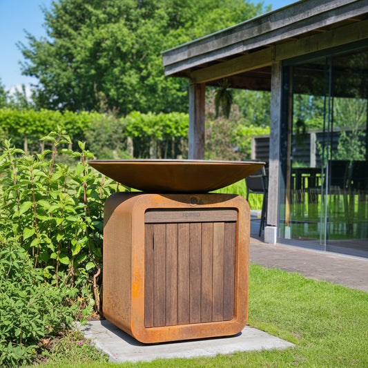 Corten Steel Seare Halo Piezo Plancha Gas Grill in a contemporary garden