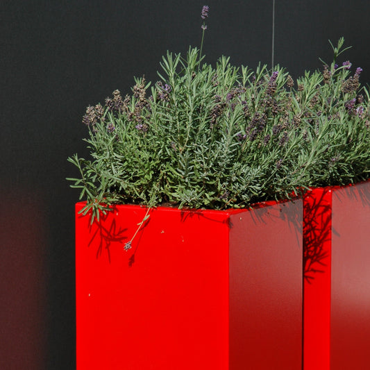 Close-up view of the Adezz Carrez Aluminium Tower Planter, showcasing its sleek vertical lines and modern design, perfect for outdoor spaces. (10144587382977) (15016976482689)