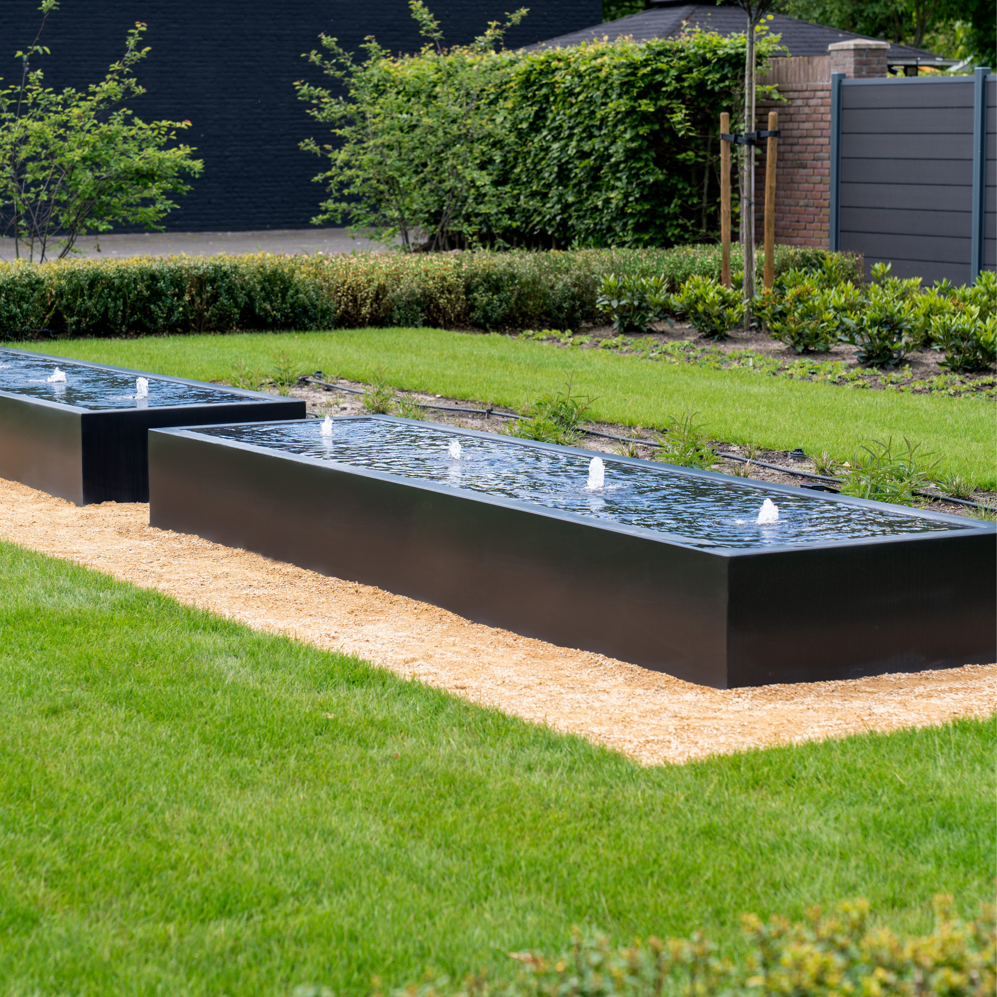 Water Features: stone-made fountain in a lush garden